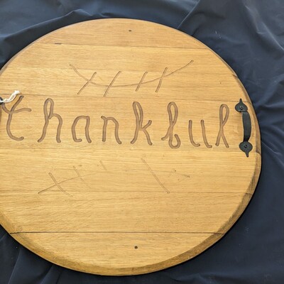 Engraved lilac photochromatic oak wine barrel lid charcuterie board, rustic handles