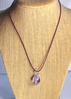 Lavender glass mushroom pendant on leather cord
