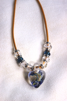 blue/clear heart pendant on leather cord